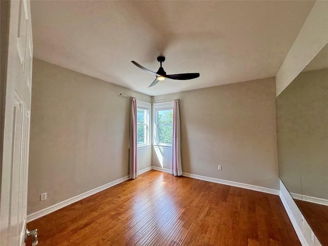 1733 Canonero Dr, Austin, TX 78746 - spare room with ceiling fan and wood finished floors