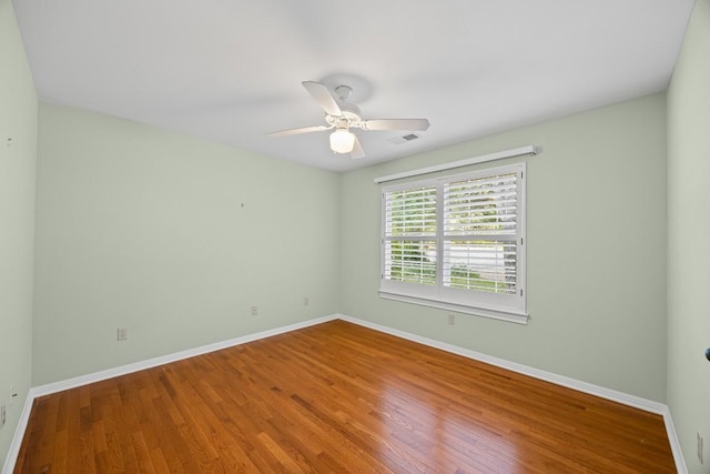 100 Broad Vista Ct, Georgetown, TX 78628 - spare room featuring wood finished floors and ceiling fan