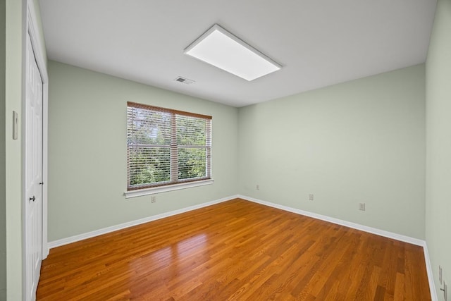 100 Broad Vista Ct, Georgetown, TX 78628 - empty room with baseboards and wood finished floors