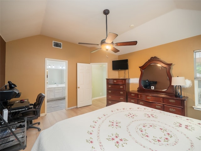 5102 Coppermead Ln, Austin, TX 78754 - bedroom featuring vaulted ceiling, light wood-style flooring, ensuite bath, a ceiling fan, and an office area