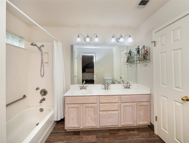 5102 Coppermead Ln, Austin, TX 78754 - bathroom with shower / tub combo with curtain, wood finished floors, double vanity, and connected bathroom