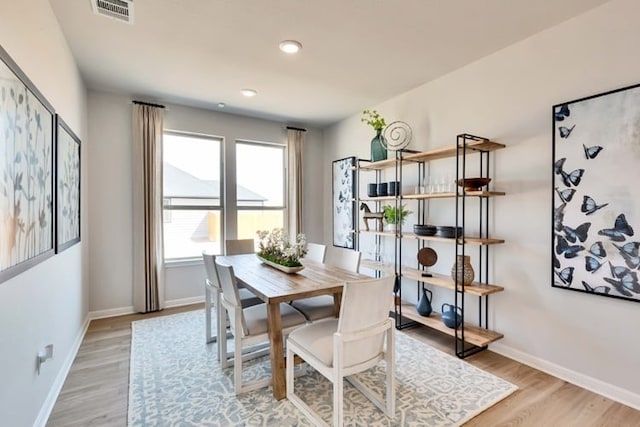 6500 Smarty Jones Ln, Buda, TX 78610 - dining area featuring light wood finished floors and recessed lighting