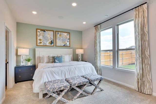 6500 Smarty Jones Ln, Buda, TX 78610 - bedroom with light colored carpet and recessed lighting