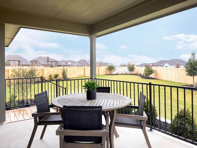 720 Sun Grove Trl, Georgetown, TX 78628 - fenced backyard with outdoor dining space, a residential view, and a wooden deck