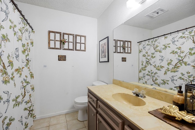 706 Cambridge Dr, Round Rock, TX 78664 - full bath featuring vanity, a textured ceiling, tile patterned floors, and curtained shower