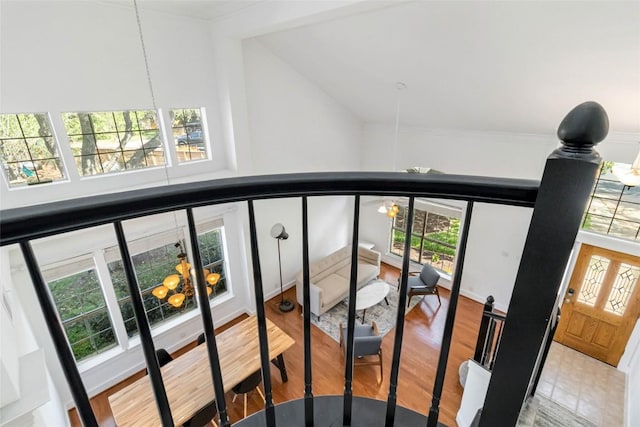 6100 Open Range Trl, Austin, TX 78749 - stairway featuring wood finished floors, high vaulted ceiling, and ornamental molding