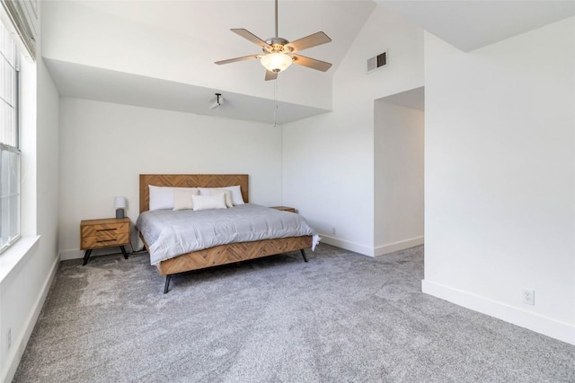 6100 Open Range Trl, Austin, TX 78749 - bedroom with carpet flooring, multiple windows, high vaulted ceiling, and a ceiling fan