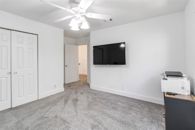 6100 Open Range Trl, Austin, TX 78749 - unfurnished bedroom with carpet, a closet, and ceiling fan