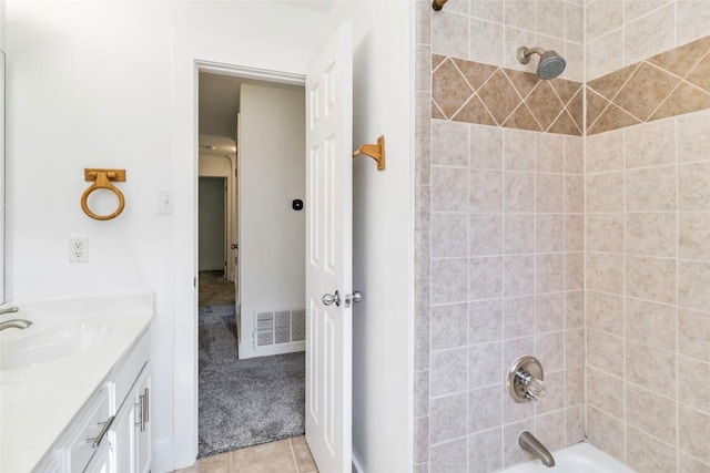 6100 Open Range Trl, Austin, TX 78749 - bathroom featuring vanity,  shower combination, and tile patterned floors