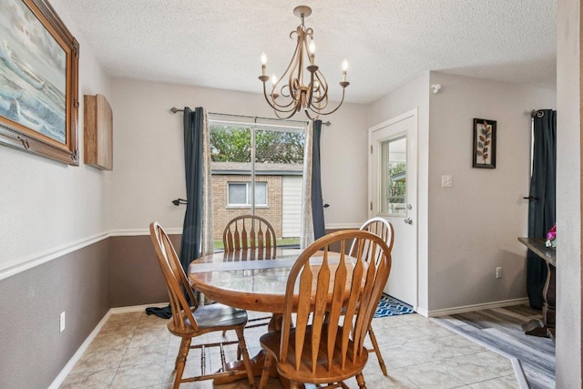 2101 Barnett Dr, Cedar Park, TX 78613 - dining room with a chandelier and a textured ceiling