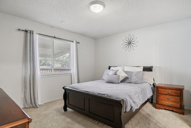 2101 Barnett Dr, Cedar Park, TX 78613 - bedroom featuring carpet floors and a textured ceiling