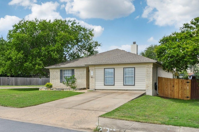 2101 Barnett Dr, Cedar Park, TX 78613 - view of front of property featuring a chimney, brick siding, and driveway