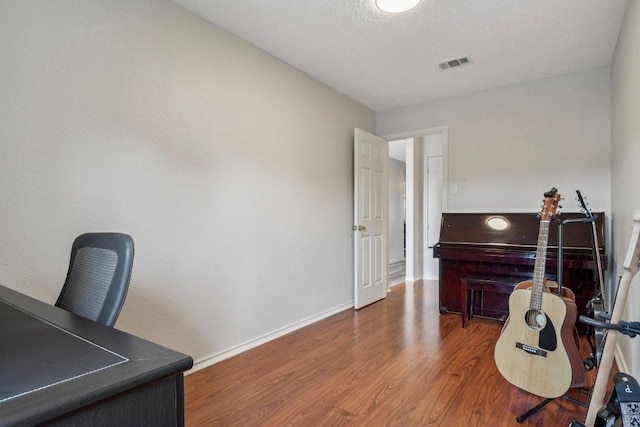2101 Barnett Dr, Cedar Park, TX 78613 - home office with wood finished floors and baseboards