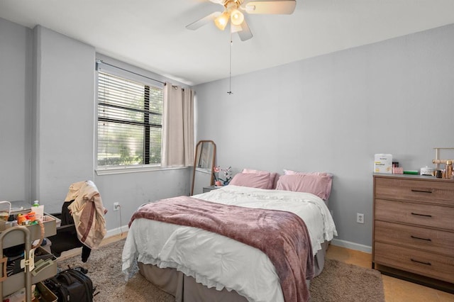 2502 Leon St Unit 102, Austin, TX 78705 - bedroom featuring baseboards and a ceiling fan