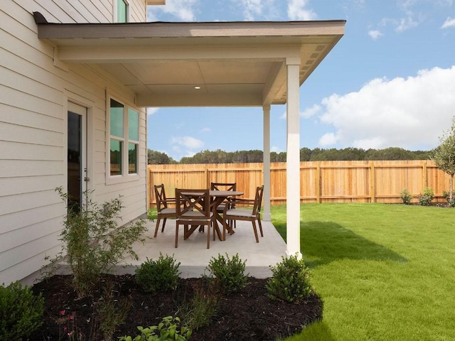 716 Sun Grove Trl, Georgetown, TX 78628 - fenced backyard featuring a patio area