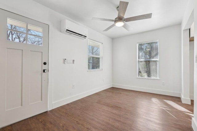 304 Harris St, Smithville, TX 78957 - entryway with a wall mounted air conditioner, plenty of natural light, wood finished floors, and ceiling fan