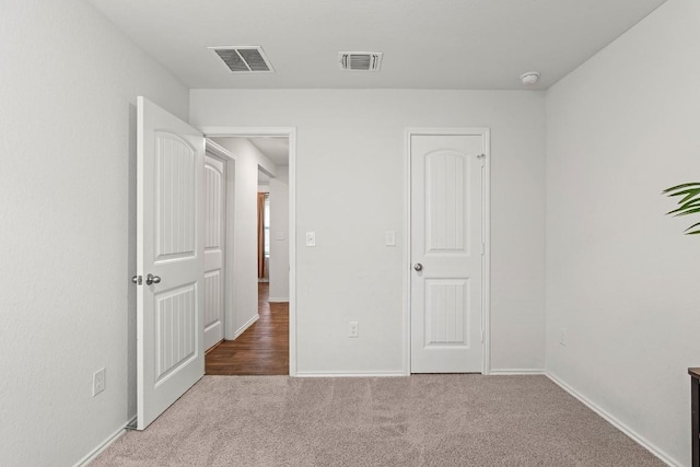 11817 Rush Ln, Elgin, TX 78621 - unfurnished bedroom featuring carpet and baseboards