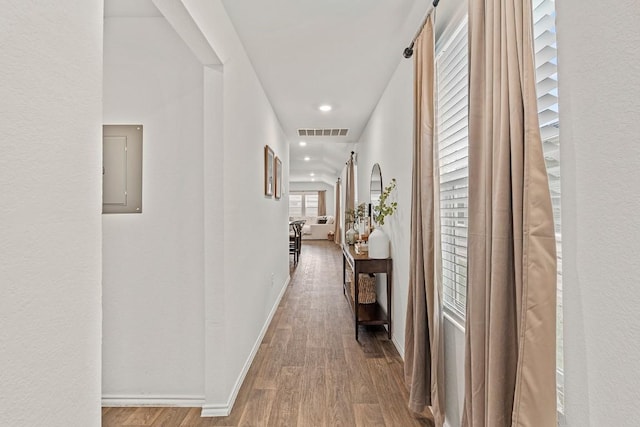 11817 Rush Ln, Elgin, TX 78621 - corridor with wood finished floors