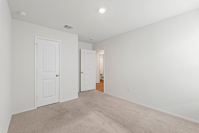 11817 Rush Ln, Elgin, TX 78621 - unfurnished bedroom with carpet flooring and baseboards