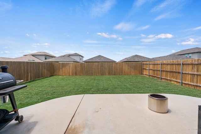 11817 Rush Ln, Elgin, TX 78621 - fenced backyard with a patio