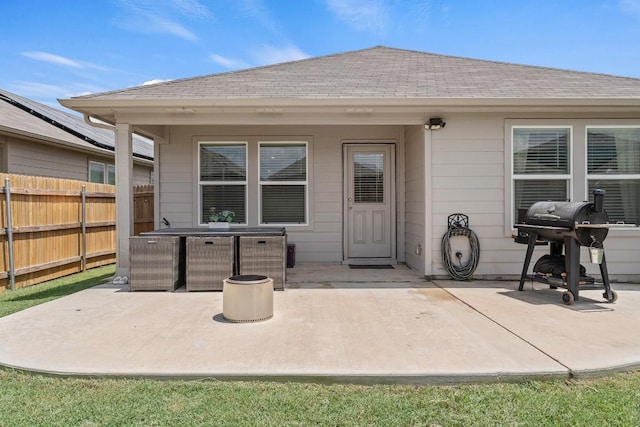 11817 Rush Ln, Elgin, TX 78621 - rear view of property with a patio and a shingled roof