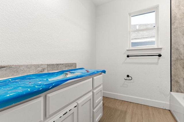 2115 Blackhawk Loop, Belton, TX 76513 - full bath featuring wood finished floors and vanity