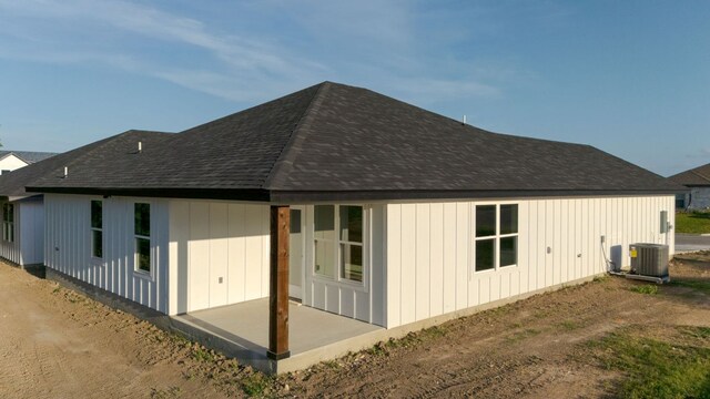 2115 Blackhawk Loop, Belton, TX 76513 - view of side of property featuring a patio area and a shingled roof