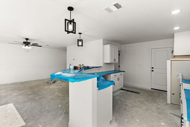 2115 Blackhawk Loop, Belton, TX 76513 - kitchen with concrete flooring, white cabinetry, a ceiling fan, decorative light fixtures, and recessed lighting