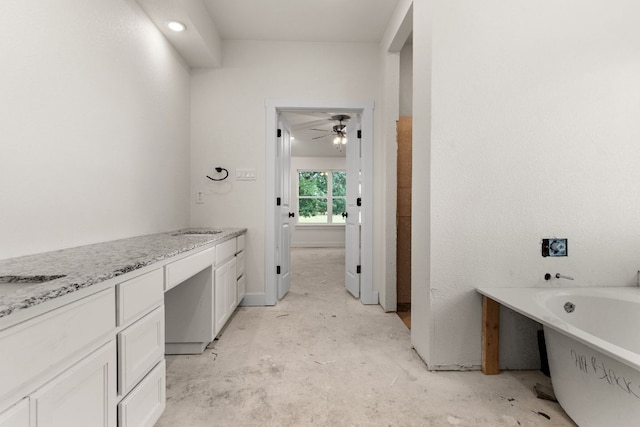 2119 Blackhawk Loop, Belton, TX 76513 - bathroom featuring a freestanding tub and ceiling fan