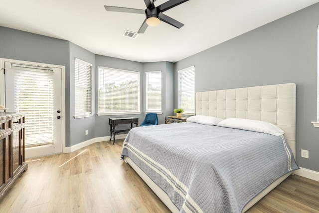 704 Deckhouse Dr, Lago Vista, TX 78645 - bedroom featuring light wood-style flooring and ceiling fan