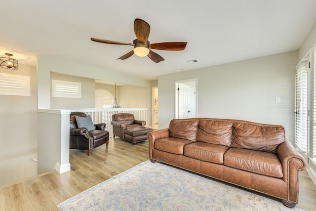 704 Deckhouse Dr, Lago Vista, TX 78645 - living area with wood finished floors and a ceiling fan