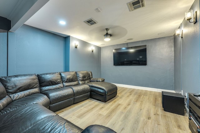 704 Deckhouse Dr, Lago Vista, TX 78645 - home theater room with wood finished floors, ceiling fan, and recessed lighting