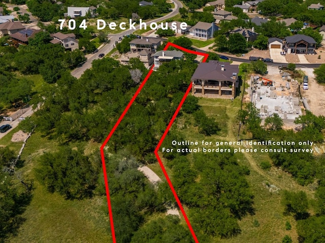 704 Deckhouse Dr, Lago Vista, TX 78645 - aerial view of residential area featuring property parcel outlined