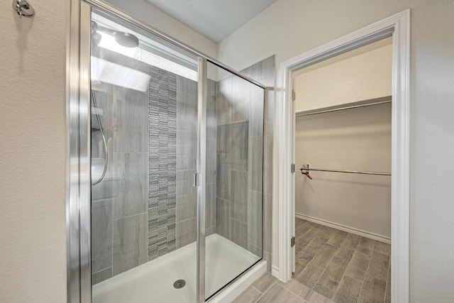 817 Choya Trl, Leander, TX 78641 - bathroom featuring a walk in closet and a stall shower