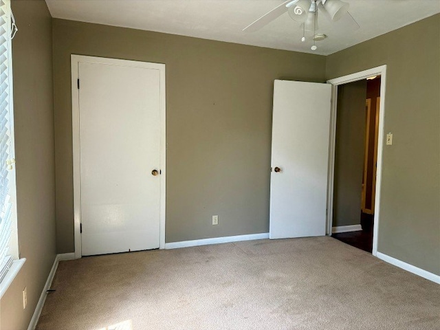 11601 Oak Trl, Austin, TX 78753 - unfurnished bedroom featuring carpet floors and ceiling fan