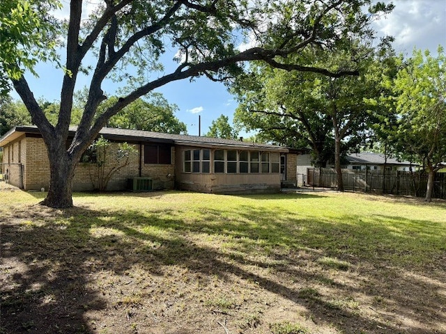 11601 Oak Trl, Austin, TX 78753 - rear view of house featuring brick siding