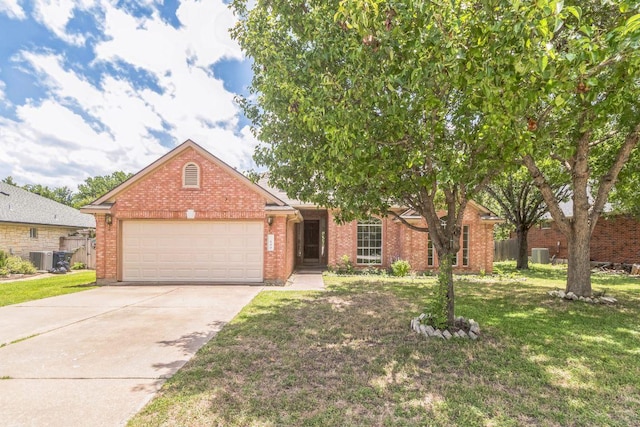 800 Mountain Ridge Dr, Leander, TX 78641 - view of front facade featuring a garage, brick siding, driveway, and a front yard