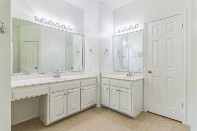 800 Mountain Ridge Dr, Leander, TX 78641 - bathroom featuring vanity and tile patterned flooring