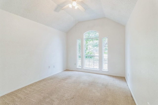 800 Mountain Ridge Dr, Leander, TX 78641 - unfurnished room featuring ceiling fan, carpet, a textured ceiling, and lofted ceiling