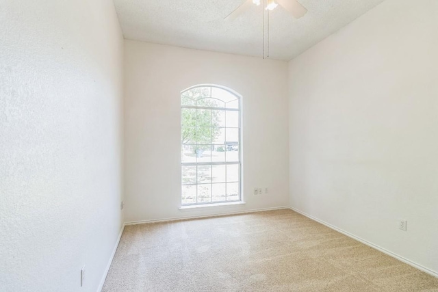 800 Mountain Ridge Dr, Leander, TX 78641 - carpeted spare room with healthy amount of natural light and a ceiling fan