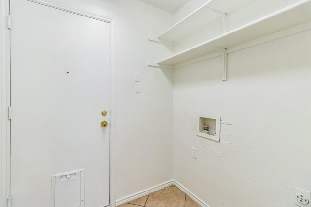 800 Mountain Ridge Dr, Leander, TX 78641 - laundry room with hookup for a washing machine and light tile patterned floors