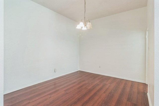 800 Mountain Ridge Dr, Leander, TX 78641 - unfurnished room featuring a chandelier and dark wood-type flooring