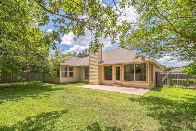 800 Mountain Ridge Dr, Leander, TX 78641 - rear view of property featuring a fenced backyard, a patio area, a chimney, and a shingled roof