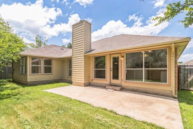 800 Mountain Ridge Dr, Leander, TX 78641 - back of house featuring a chimney, a patio, and a shingled roof