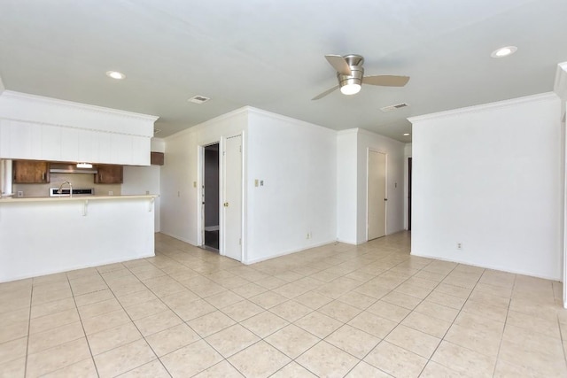 803 Easy Day Cv, Austin, TX 78745 - unfurnished living room featuring ornamental molding, a ceiling fan, recessed lighting, and light tile patterned floors