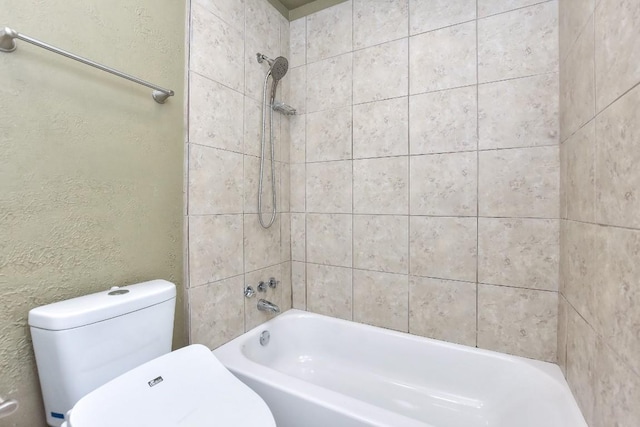 803 Easy Day Cv, Austin, TX 78745 - bathroom featuring shower / tub combination and a textured wall