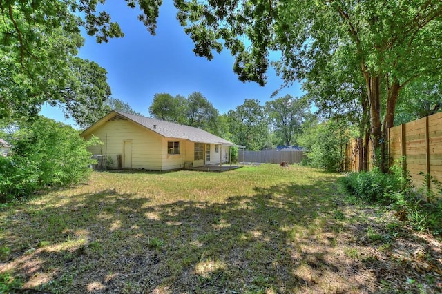 803 Easy Day Cv, Austin, TX 78745 - fenced backyard with a patio