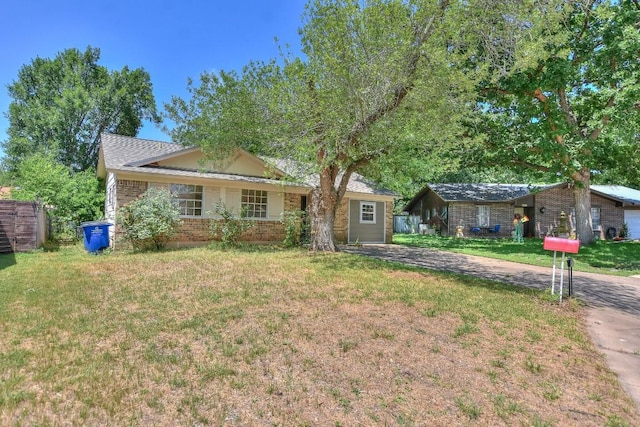 803 Easy Day Cv, Austin, TX 78745 - single story home featuring brick siding and a front lawn