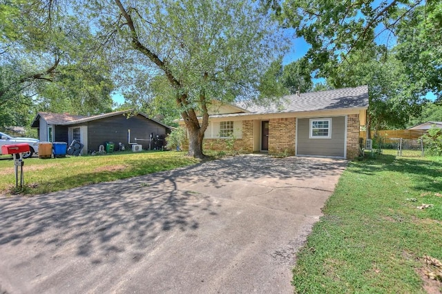 803 Easy Day Cv, Austin, TX 78745 - ranch-style home with brick siding and concrete driveway