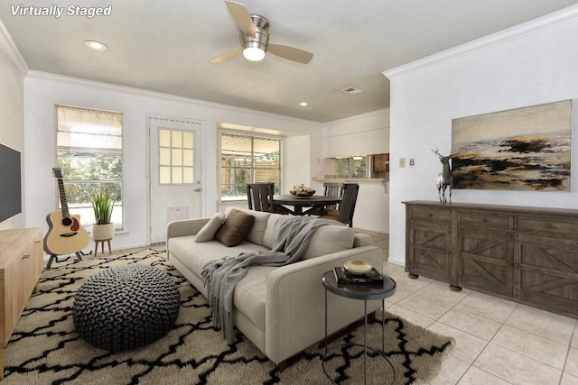 803 Easy Day Cv, Austin, TX 78745 - living room with crown molding, ceiling fan, light tile patterned floors, and recessed lighting